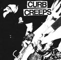 Close-up of the vinyl record "Curb Creeps" S/T 7-inch EP by Cease & Desist Records with the black and white cover art.