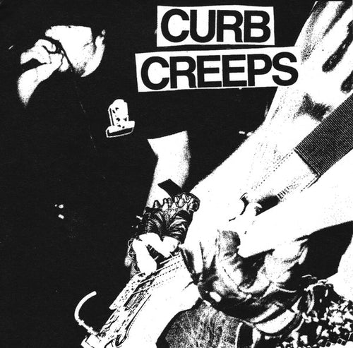 Close-up of the vinyl record "Curb Creeps" S/T 7-inch EP by Cease & Desist Records with the black and white cover art.